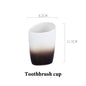 Washing suit couple brushing teeth and mouthwash cup